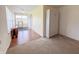 Sun room featuring laminate flooring, a murphy bed, large windows, and plenty of natural light at 10822 Cape Coral Ln, Indianapolis, IN 46229