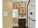 Bathroom boasts a vanity, decorative mirror, ornate lighting, and tiled shower with glass door at 110 W Buckeye St, Cicero, IN 46034