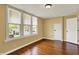 This bedroom features hardwood floors, and natural light from the windows at 110 W Buckeye St, Cicero, IN 46034