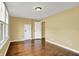 This bedroom features hardwood floors, and natural light from the windows at 110 W Buckeye St, Cicero, IN 46034