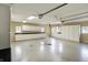 Spacious garage features built-in white cabinetry, work surfaces, and ample storage, perfect for organization at 110 W Buckeye St, Cicero, IN 46034