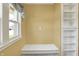 Comfortable window seat with storage and bright natural light, perfect for relaxing and enjoying the view at 110 W Buckeye St, Cicero, IN 46034
