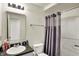 Bathroom featuring a sink, toilet, mirror, vanity and combination shower and bathtub at 11603 Presidio Dr, Indianapolis, IN 46235