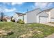 Charming home showcasing a side view, attached garage, and a well-kept lawn at 11603 Presidio Dr, Indianapolis, IN 46235