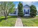 Charming single-story home with a well-manicured lawn and attractive landscaping at 11603 Presidio Dr, Indianapolis, IN 46235