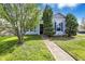 Attractive single-story home featuring a lush green lawn and carefully trimmed landscaping at 11603 Presidio Dr, Indianapolis, IN 46235