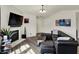 Stylish living room with a fireplace, contemporary decor, and comfortable seating at 11603 Presidio Dr, Indianapolis, IN 46235