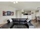 Cozy living room showcasing comfortable seating, modern accents, and seamless access to other rooms at 11603 Presidio Dr, Indianapolis, IN 46235