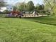 Enjoy the outdoors at this neighborhood playground with play equipment and green space at 11875 Buck Creek Cir, Noblesville, IN 46060