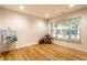 Bright basement featuring hardwood floors, a window and tasteful decor at 11905 Kelso Dr # 3, Zionsville, IN 46077