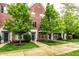 Lovely brick townhomes with well-maintained lawns and beautiful trees at 11905 Kelso Dr # 3, Zionsville, IN 46077