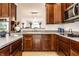 Eat-in kitchen featuring a kitchen island and stainless steel appliances at 11905 Kelso Dr # 3, Zionsville, IN 46077