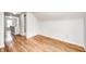 Hallway features hardwood floors and access to adjacent rooms at 1231 Nester St, Speedway, IN 46224