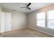 Bedroom with neutral carpet, bright windows and modern ceiling fan at 12704 Bearsdale Dr, Indianapolis, IN 46235