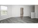 The spacious living room offers hardwood floors, providing a serene space for relaxation at 12704 Bearsdale Dr, Indianapolis, IN 46235