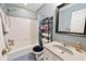 Bathroom featuring white subway tile, gray vanity and toilet at 12981 Coyote Run, Fishers, IN 46038