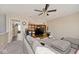Cozy upstairs loft with ceiling fan and neutral walls is the perfect area for a hang out at 12981 Coyote Run, Fishers, IN 46038