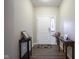 Inviting entryway with hardwood floors and decorative console tables at 1299 W Crystal Dr, Fortville, IN 46040