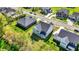 Overhead view of lovely homes with pristine lawns in a charming, tree-lined neighborhood at 14349 Marsdale Pl, Carmel, IN 46074