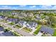 An aerial view showcases a well-planned residential community with ponds and landscaped streets at 14349 Marsdale Pl, Carmel, IN 46074
