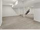 Finished basement features neutral carpet and stairway access at 14349 Marsdale Pl, Carmel, IN 46074
