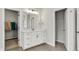 Bathroom vanity with a walk in closet and a separate bathroom space at 14349 Marsdale Pl, Carmel, IN 46074