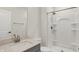 Modern bathroom with walk-in shower, vanity, and granite countertops at 14349 Marsdale Pl, Carmel, IN 46074
