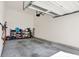 Clean garage with shelving, tool storage and ample space for vehicles and projects at 14349 Marsdale Pl, Carmel, IN 46074