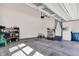 Well-organized garage with storage shelves, bicycles, and ample space for parking at 14349 Marsdale Pl, Carmel, IN 46074