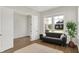 Inviting living room features stylish furniture, hardwood floors, and large windows with natural light at 14349 Marsdale Pl, Carmel, IN 46074