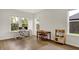 Bright office space with desk, play area, and natural light from large windows at 14349 Marsdale Pl, Carmel, IN 46074
