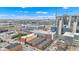 Aerial shot showcases a brick apartment complex amidst city development and a mural building at 1476 N Illinois St, Indianapolis, IN 46202