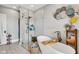Luxurious bathroom showcasing a modern standalone tub and a glass-enclosed shower with decorative accents at 1476 N Illinois St, Indianapolis, IN 46202
