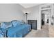 This cozy bedroom has a daybed, soft colors, natural light, and ample closet space at 1476 N Illinois St, Indianapolis, IN 46202