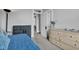 This bedroom has a daybed, storage, natural light, and ample closet space at 1476 N Illinois St, Indianapolis, IN 46202