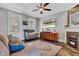 Inviting living area featuring hardwood floors and a decorative fireplace at 1476 N Illinois St, Indianapolis, IN 46202