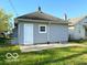 Home's backyard offers a private outdoor space and is complemented by the home's neutral siding at 1510 W 22Nd St, Indianapolis, IN 46202