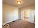 View of a bedroom with doorway and open French doors at 1510 W 22Nd St, Indianapolis, IN 46202