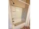 Clean shower and tub combination with neutral color palette and updated shower head at 1510 W 22Nd St, Indianapolis, IN 46202