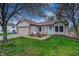 Charming home featuring a well-maintained lawn, attached garage, and inviting front entrance at 1910 Riverstone Ct, Westfield, IN 46074