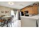 Bright eat-in kitchen featuring stainless steel appliances, granite countertops, and natural light at 1910 Riverstone Ct, Westfield, IN 46074