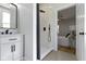 Modern bathroom with a stand-up shower and a view into the bedroom at 2005 Carrollton Ave, Indianapolis, IN 46202