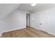 Bedroom with neutral colors, with a view to an open closet and other rooms at 2005 Carrollton Ave, Indianapolis, IN 46202