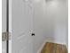 Small closet with luxury vinyl plank flooring and minimal interior finishes at 2005 Carrollton Ave, Indianapolis, IN 46202
