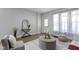 Living room featuring neutral paint, stylish decor, light-colored hardwood floors and natural light at 2005 Carrollton Ave, Indianapolis, IN 46202