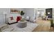 Well-lit living room boasts stylish furniture, light wood floors and an open floorplan at 2005 Carrollton Ave, Indianapolis, IN 46202