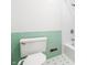 Bathroom with toilet, tub, shower and green tile at 2141 Rome Dr # Apt B, Indianapolis, IN 46228