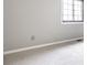 Neutral bedroom with carpeted floors, light gray walls, and a window at 2141 Rome Dr # Apt B, Indianapolis, IN 46228