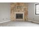 Living room fireplace featuring a tile surround and hearth at 2141 Rome Dr # Apt B, Indianapolis, IN 46228