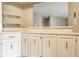 Traditional kitchen featuring white cabinets and countertops and built-in shelves at 2141 Rome Dr # Apt B, Indianapolis, IN 46228